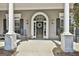 Inviting front porch with rocking chairs, decorative wreath, and classic design at 410 Denton Cir, Fayetteville, GA 30215