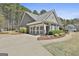 Attached two-car garage with painted doors and well-maintained landscaping at 410 Denton Cir, Fayetteville, GA 30215