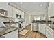 Well-equipped kitchen with stainless steel appliances, granite countertops, and ample storage at 410 Denton Cir, Fayetteville, GA 30215