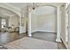 Spacious living area with hardwood floors, columns, and ample natural light at 410 Denton Cir, Fayetteville, GA 30215
