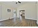Beautiful living room with vaulted ceilings, and open concept design to kitchen and dining room at 410 Denton Cir, Fayetteville, GA 30215