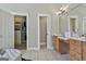 Main bathroom featuring vanity, closets and separate rooms for the toilet and shower at 410 Denton Cir, Fayetteville, GA 30215