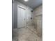 Modern bathroom with marble-style tiling and glass-door shower at 2470 Wevok Way, Grayson, GA 30017