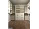 Walk-in closet featuring built-in shelving and drawers, perfect for organizing your wardrobe at 2470 Wevok Way, Grayson, GA 30017