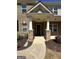 Inviting covered front porch with brick columns, providing a warm welcome to the home at 2470 Wevok Way, Grayson, GA 30017