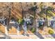 Aerial view displays a home, nestled among trees, offering a serene, private setting at 140 Jodeco Station Ter, Stockbridge, GA 30281