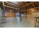Unfinished basement featuring exposed beams, concrete floor, and a utility area, ready for customization and expansion at 140 Jodeco Station Ter, Stockbridge, GA 30281