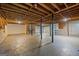 Unfinished basement with concrete floors and exposed ceiling, ready for your custom design and finishing touches at 140 Jodeco Station Ter, Stockbridge, GA 30281