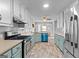 Charming kitchen boasts ample counter space, stainless steel appliances, and eat-in area at 140 Jodeco Station Ter, Stockbridge, GA 30281