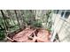 Multi-level wooden deck overlooks a wooded backyard, perfect for outdoor enjoyment at 3626 Lone Indian Trl, Marietta, GA 30066