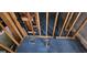 Unfinished basement space showing under-house construction and a drain access point at 3626 Lone Indian Trl, Marietta, GA 30066
