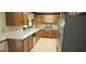 Kitchen with wood cabinets, stainless steel appliances, and light countertops at 3626 Lone Indian Trl, Marietta, GA 30066