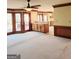 Spacious living room with large windows and doors to the deck at 3626 Lone Indian Trl, Marietta, GA 30066