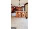 Open floor plan with bar stools, fireplace, and tile floors at 3626 Lone Indian Trl, Marietta, GA 30066