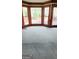 Living room with bay windows and access to the deck at 3626 Lone Indian Trl, Marietta, GA 30066