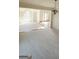 Bright living room with carpeted floors, staircase and grand window at 3626 Lone Indian Trl, Marietta, GA 30066