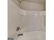Close-up of a white tiled shower and tub combination with chrome fixtures at 3713 Upland Dr, Mcdonough, GA 30253