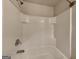 Close-up of a white tiled shower and tub combination with chrome fixtures at 3713 Upland Dr, Mcdonough, GA 30253