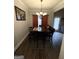 Cozy dining room with natural light and seating for six at 2275 Church St, Hampton, GA 30228