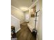 Hallway featuring a bench and coat rack near the front door and stairs at 2275 Church St, Hampton, GA 30228