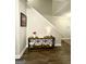 Entryway featuring a decorative console table and wood-look flooring at 2275 Church St, Hampton, GA 30228