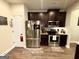 Bright kitchen with stainless steel appliances and ample cabinet space at 2275 Church St, Hampton, GA 30228