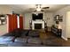 Comfortable living room features a fireplace, large TV, and plush sectional seating at 2275 Church St, Hampton, GA 30228
