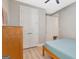 Comfortable bedroom with wood floors, double closets, and a serene ambiance for peaceful relaxation at 108 Mulberry Ct, Peachtree City, GA 30269
