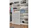 Well-organized walk-in closet with custom shelving and storage solutions at 108 Mulberry Ct, Peachtree City, GA 30269