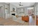 Bright living room featuring a fireplace, built-in shelving, and comfortable leather seating at 108 Mulberry Ct, Peachtree City, GA 30269