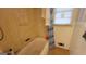 Modest bathroom featuring a standard bathtub and a window, exuding a simple and functional design at 617 Virginia Cir, Forest Park, GA 30297
