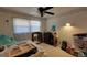 Bedroom featuring a ceiling fan, floral wallpaper border and one window at 617 Virginia Cir, Forest Park, GA 30297