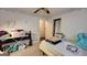 Bedroom featuring a ceiling fan, floral wallpaper border and one window at 617 Virginia Cir, Forest Park, GA 30297