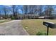 Charming single-story home with a brick facade and a well-manicured front lawn at 617 Virginia Cir, Forest Park, GA 30297