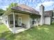 Back porch area with table and chairs and vinyl siding at 116 Evenview Dr., Jonesboro, GA 30236