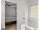 Bright bathroom boasts a large soaking tub, natural light, and neutral color palette at 116 Evenview Dr., Jonesboro, GA 30236