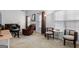 Bright living room with multiple windows and contemporary furniture and decor at 116 Evenview Dr., Jonesboro, GA 30236