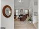 Bright living room with a fireplace, neutral carpet, and comfortable, contemporary furnishings at 116 Evenview Dr., Jonesboro, GA 30236