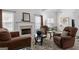 Cozy living space with a fireplace and ample seating for relaxation and entertaining at 116 Evenview Dr., Jonesboro, GA 30236