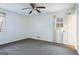 Neutral bedroom with carpeted floors and a bright window for ample natural light at 4230 Iris Brooke Ln, Snellville, GA 30039