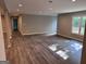 Finished basement featuring gray paint, wood floors, recessed lighting, and natural light from an egress window at 281 New Hope Dr, Mcdonough, GA 30252