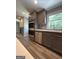Modern kitchen showcasing stainless steel appliances, gray cabinets, and stylish backsplash at 281 New Hope Dr, Mcdonough, GA 30252