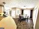 Dining area featuring tile floor, and seating for four near the kitchen area at 40 Pebble Brooke Ct, Covington, GA 30016