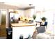 Bright kitchen with white cabinets and stainless steel refrigerator at 40 Pebble Brooke Ct, Covington, GA 30016