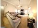 Spacious living room featuring cozy seating, fireplace, and abundant natural light at 40 Pebble Brooke Ct, Covington, GA 30016