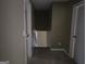 Hallway with many doors and stairway at 6733 Jojanne Ln, Lithonia, GA 30038