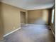 Spacious living room with neutral carpet and fresh paint, ready for personalization at 6733 Jojanne Ln, Lithonia, GA 30038
