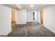 Finished basement with carpeted floors, bright walls, and doorway entrances to other rooms at 364 Valleyside Dr, Dallas, GA 30157
