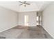 Neutral bedroom featuring neutral walls, plush carpet, and doorway entrances to other rooms at 364 Valleyside Dr, Dallas, GA 30157