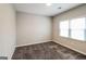 Bedroom featuring carpet floors, a window with blinds, and neutral paint throughout at 364 Valleyside Dr, Dallas, GA 30157